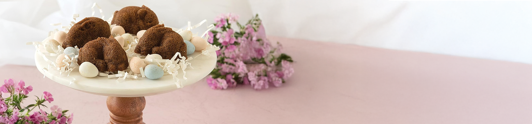 Photo of Nordic Ware Bunny Bites Cake Bites on cake stand.