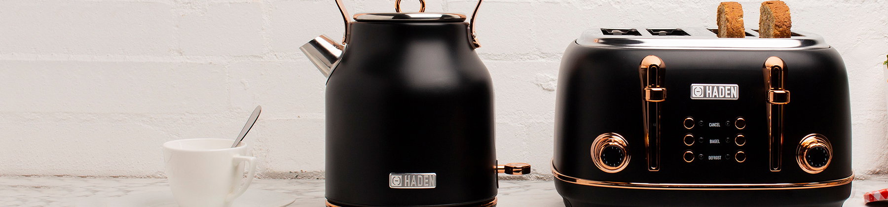 Photo of Haden black copper kettle and toaster.