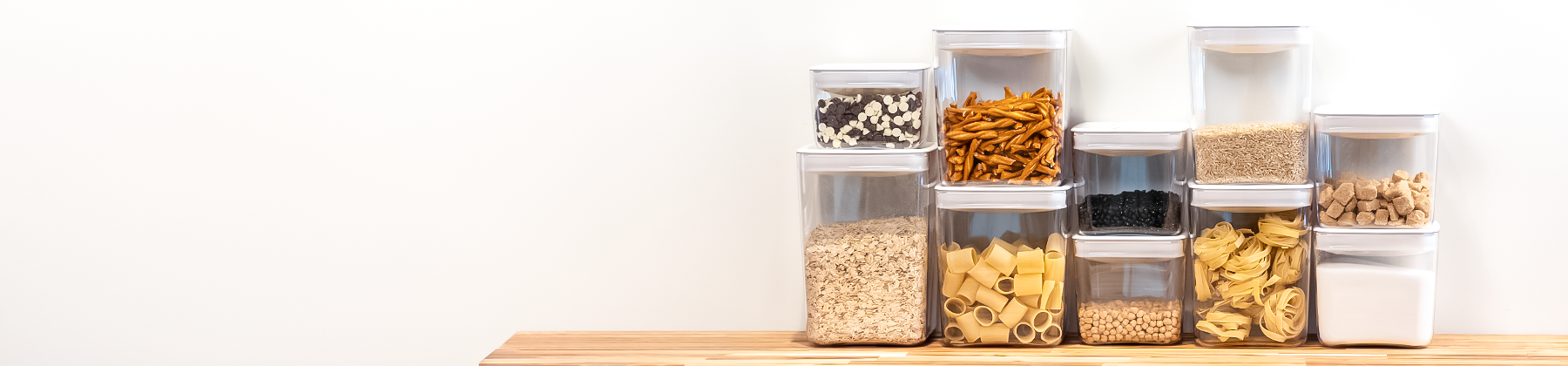 shelf full of Click Clack storage containers.