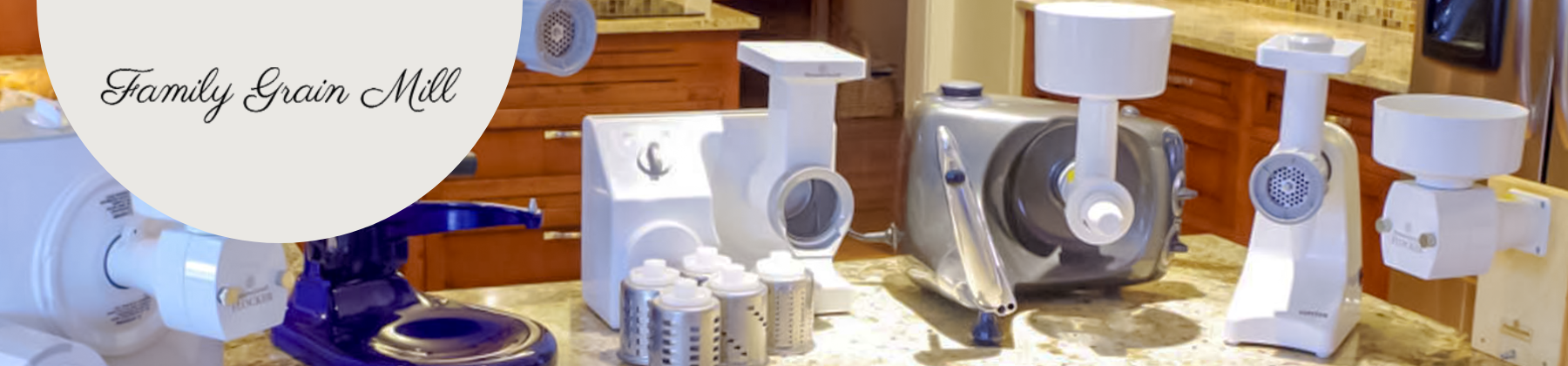 Photo of various Family Grain Mill products showcased on a countertop.