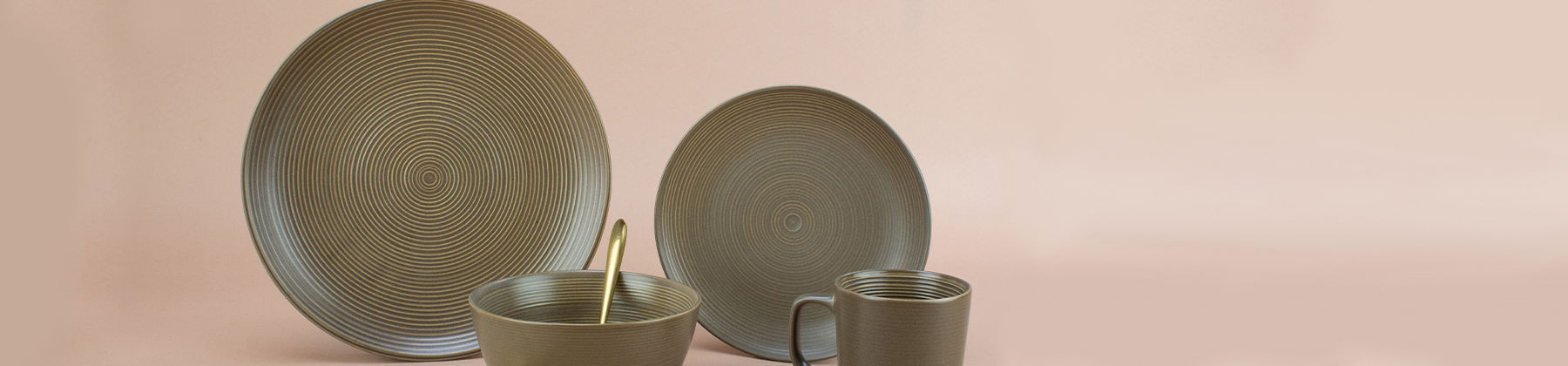 Photo of Everything Kitchens Modern Colorful Neutrals Rippled Matte dinnerware at wooden table.