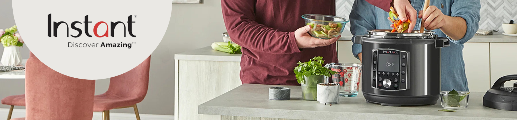Photo of black Instant Pot with various ingredients on countertop.
