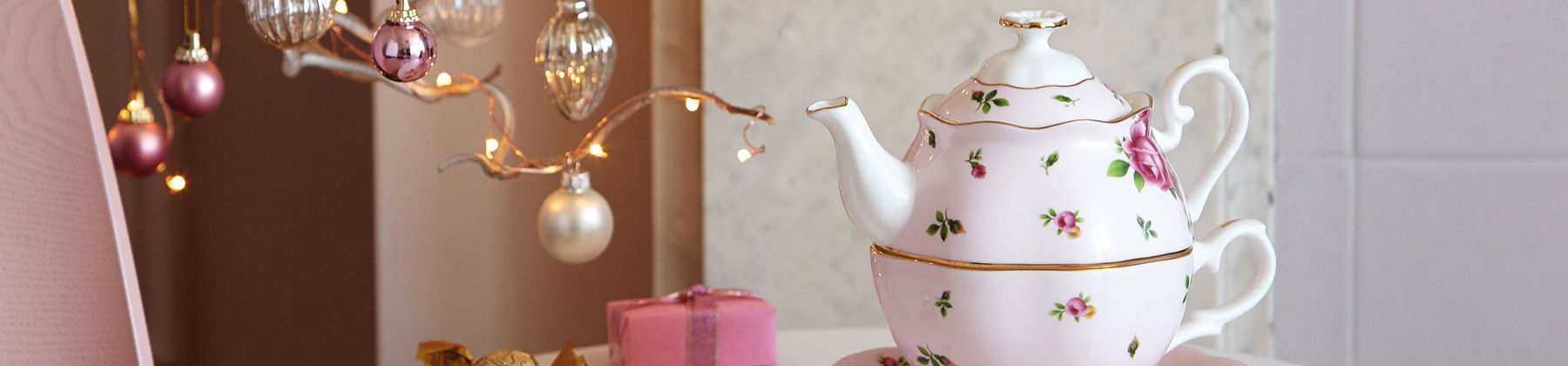 Photo of Royal Albert teapot on a decorated table.