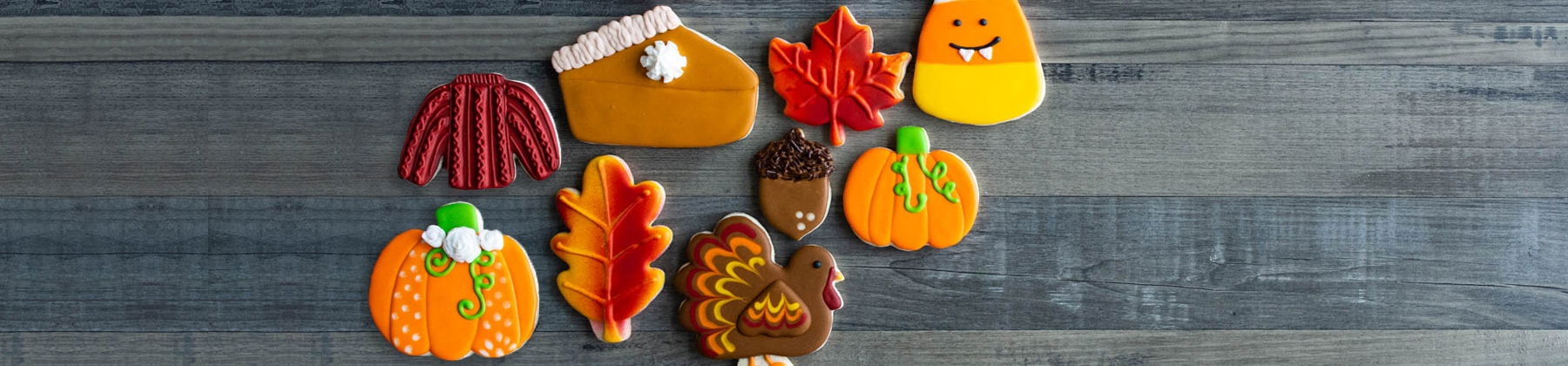 Photo of autumn shaped cookies like leaves, pumpkin, acorn, etc..