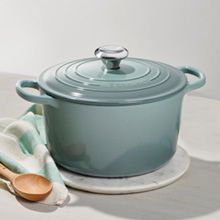 Le Creuset Enameled Cast Iron Signature 3 1/2 Quart Round Dutch Oven in  Flame — Las Cosas Kitchen Shoppe