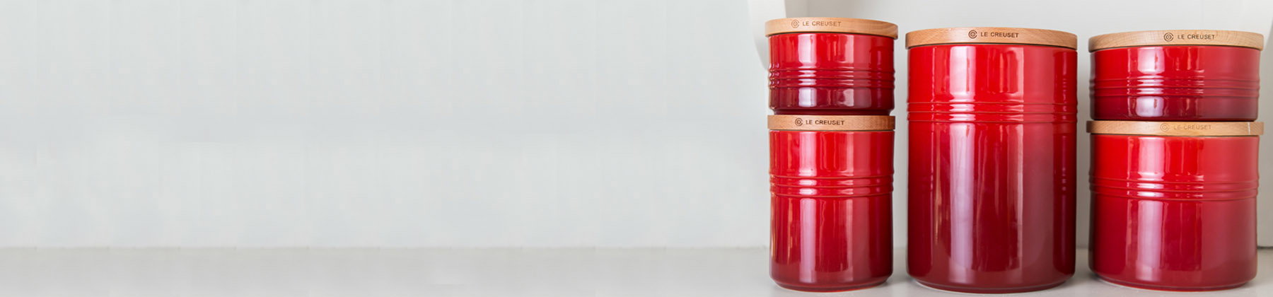 Photo of Le Creuset storage canisters.
